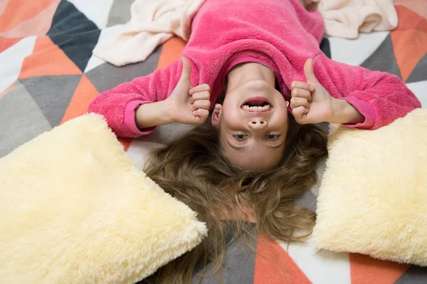 Having fun. Pajama party. Good night. Little happy girl in bedroom. Childhood happiness. Good morning. International childrens day. Small girl child ready to sleep. Time to relax — Stock Photo, Image