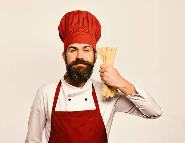 Man met baard op witte achtergrond. Koken met een glimlachend gezicht — Stockfoto