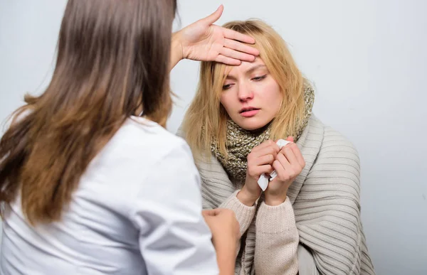 Medical examination. Doctor and patient concept. Adult fever symptoms. Treatment and when to call doctor. Doctor woman examine sick person. Home visiting doctor service. Recognize symptoms of cold — Stock Photo, Image