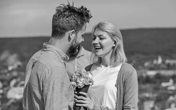 Couple in love dating while jealous bearded man watching wife cheating him with lover. Couple romantic date lovers bouquet flowers. Infidelity concept. Lovers meeting outdoor flirt romance relations — Stock Photo, Image