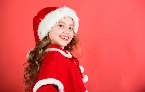 Christmas tradition holiday. Top christmas celebration ideas. Winter holidays concept. Child red santa costume ready to celebrate. Merry christmas and happy new year. Enjoy christmas holidays Stock Photo