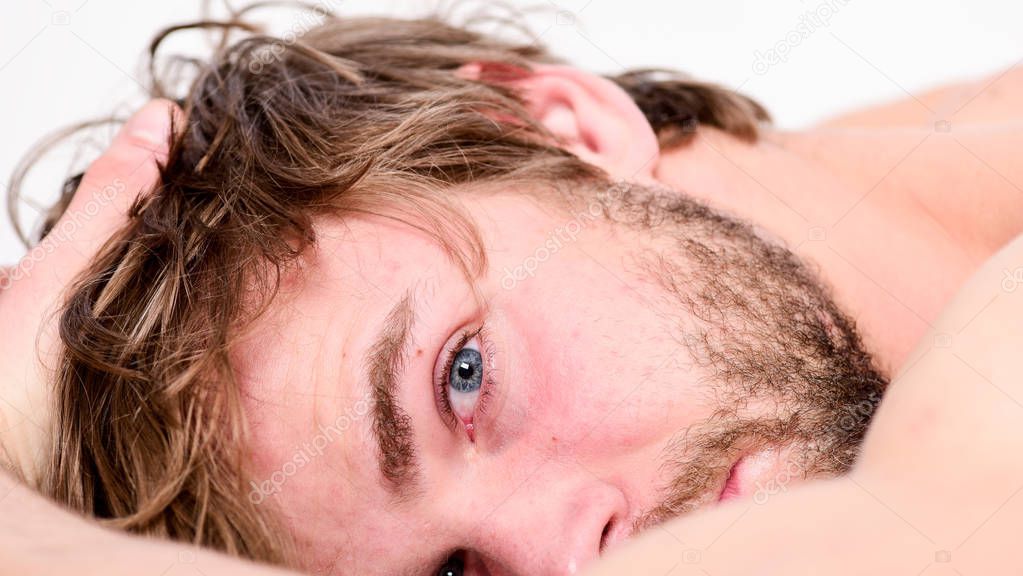 Guy bearded macho relax in morning. Total relax concept. Man attractive macho relax and feel comfortable. Simple tips to improve your sleep. Man unshaven bearded face sleep relax or just wake up