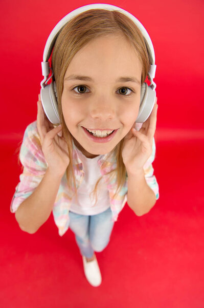 Get music account subscription. Enjoy music concept. Music always with me. Little girl listen song headphones. Online radio station channel. Leisure concept. Girl child listen music modern headphones