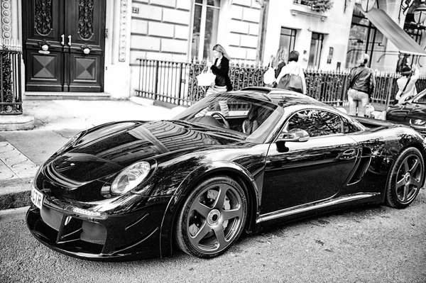 Luxury Supercar Porsche RUF CTR3 Clubsport black color parked on the street in Paris. Porshe is famous expensive automobile brand car — Stock Photo, Image