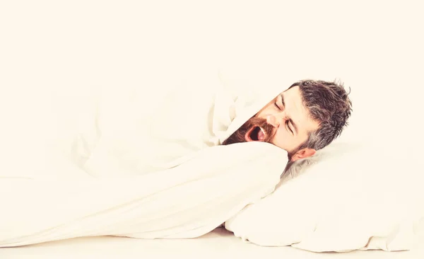 Weekend leisure concept. Man with yawning face