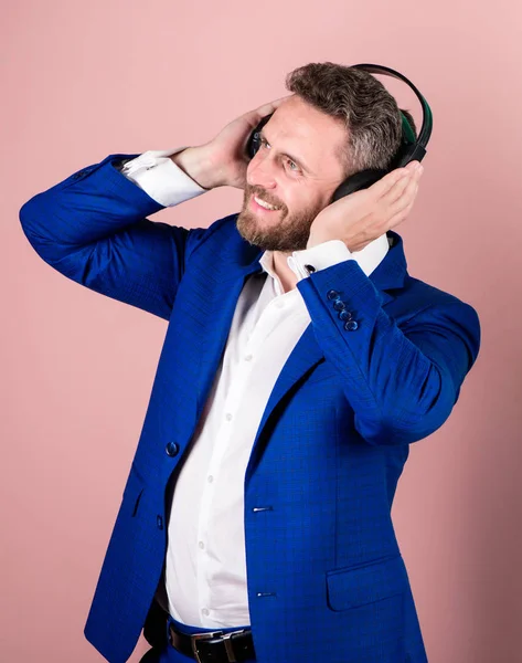 Playlist for office work. Music break during working day. Business man with headphones listening music. Businessman listen music and dance. Music and relax. Man bearded face formal suit enjoy song