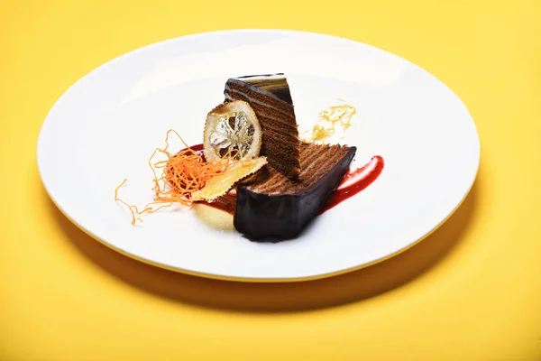 Luxury patisserie concept. Piece of chocolate cake with many layers