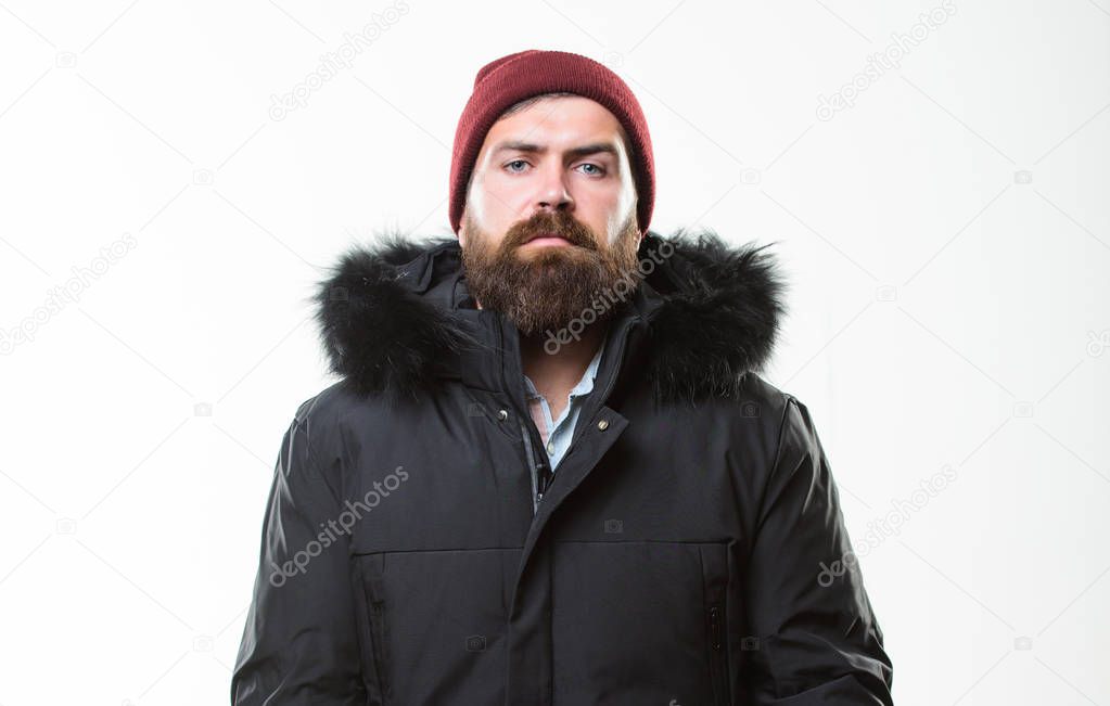 Hood adds warmth and weather resistance. Man bearded stand warm jacket parka isolated on white background. How to choose best winter jacket. Weather resistant jacket concept. Winter season menswear