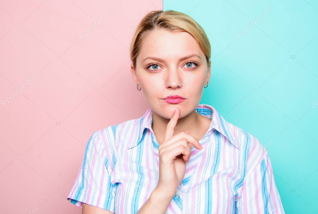 Woman concentrated face finger chin thinking. Need time to make decision. Come up with idea. Thinking about idea. Girl blonde thoughtful face expression close up. Ready to share idea concept