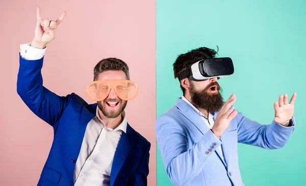 Real fun and virtual alternative. Man with beard in VR glasses and louvered plastic accessory. Guy interact in virtual reality. Hipster exploring virtual reality. Business implement modern technology