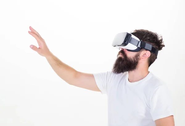 Interactive surface virtual reality concept. Guy with head mounted display interact virtual reality. Hipster exploring virtual reality. Virtual life. Man bearded hipster VR glasses white background