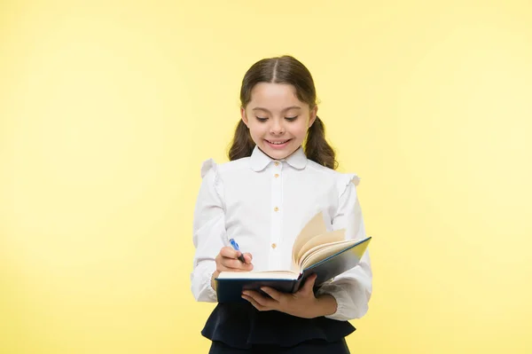 Smart school girl. childrens day. small girl child. private teaching. Education online. happy little girl in school uniform. Back to school. Childhood happiness. School curriculum