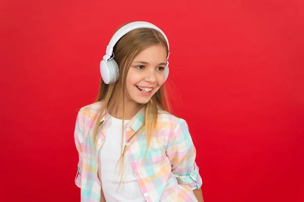 Online radio station channel. Girl child listen music modern headphones. Get music account subscription. Enjoy music concept. Music always with me. Leisure concept. Little girl listen song headphones