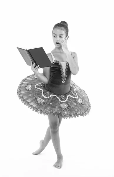 Ballet girl with book. Small girl study and train, education. Small ballerina reading book. She is in love with ballet. Improving herself through education — Stock Photo, Image