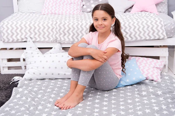 Happy little girl. Beauty and fashion. Childhood happiness. small girl child with perfect hair. International childrens day. small kid fashion. Gorgeous and beautiful. cute kid in bedroom — Stock Photo, Image