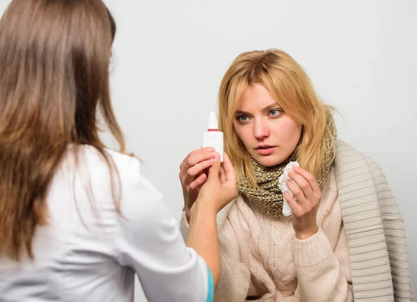 Girl in scarf hold tissue while doctor offer treatment. Cold and flu remedies. Recognize symptoms of cold. Remedies should help beat cold fast. Tips how to get rid of cold. Woman consult with doctor — Stock Photo, Image