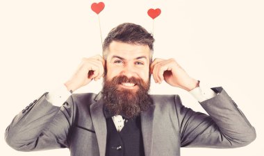 Crazy from love concept. Hipster with beard and smiling face is crazy from love clipart