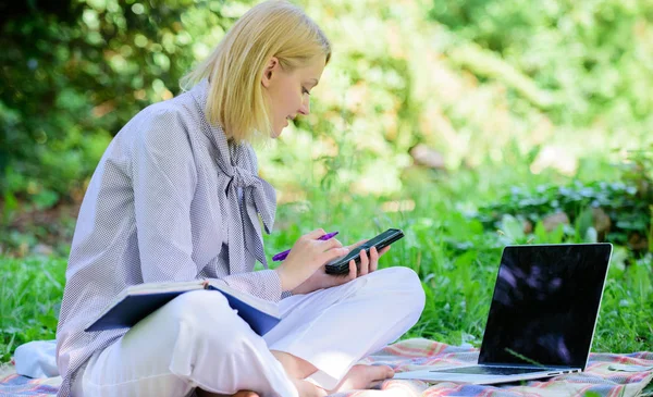 Guide starting freelance career. Become successful freelancer. Managing business outdoors. Woman with laptop sit grass meadow. Business lady freelance work outdoors. Freelance career concept — Stock Photo, Image