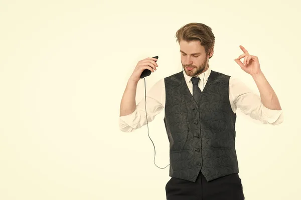 Homem de negócios em fone de ouvido com telefone celular . — Fotografia de Stock