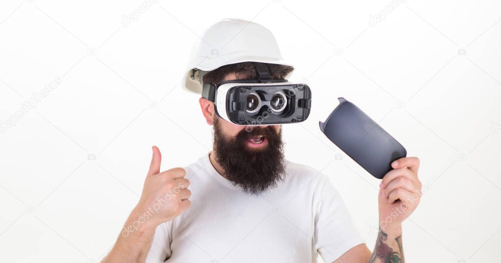 Man wearing virtual reality goggles. Man wearing virtual reality goggles in white background. Virtual reality.
