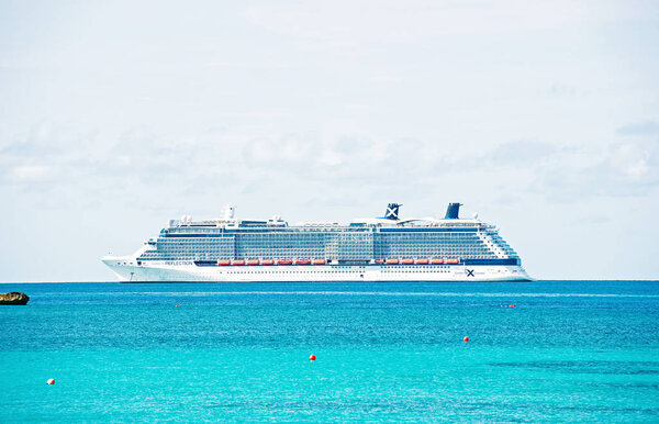ocean liner ship in sea on blue sky. Water transport, vessel, transportation. Vacation, wanderlust, travel. Adventure, discovery, journey.