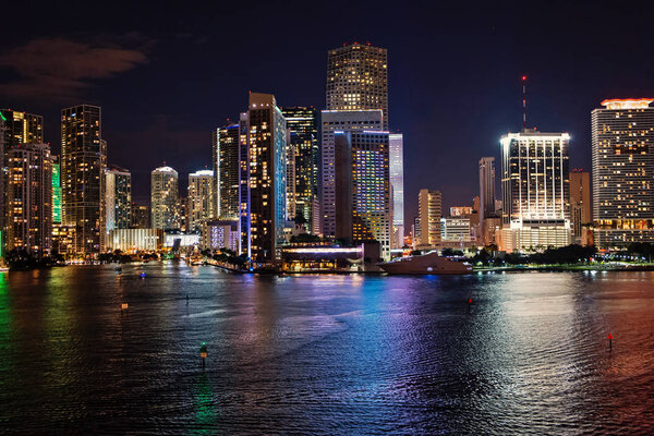 Miami, Florida, USA skyline on Biscayne Bay. Luxuru life concept. glowing view of Miami downtown.