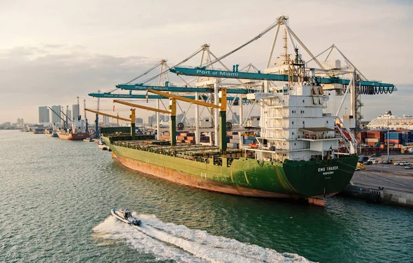 Cargo ship with cranes in sea port. Maritime container port or terminal. Shipping, freight, logistics, merchandise. Water transport, vessel, transportation. — Stock Photo, Image