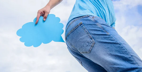 Man suffers from diarrhea. The guy is holding farting cloud near ass trying to hold back the urge. No farting allowed. — Stock Photo, Image