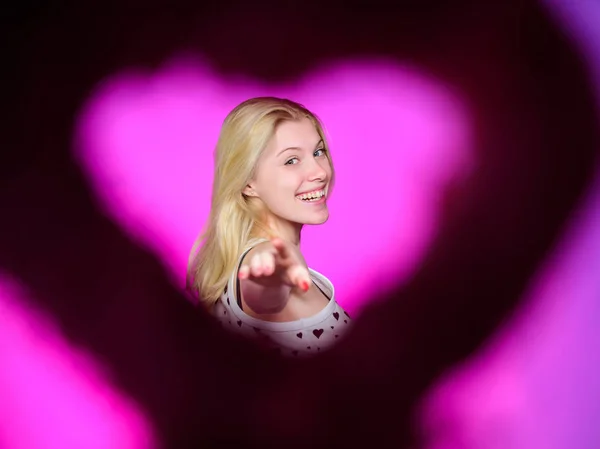 Pick me for romantic date. View through heart shape silhouette woman pretty fashion model. Happy valentines day. Valentines day attribute. Prepare celebration valentines day. Love and romance