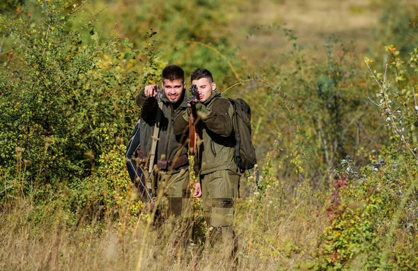 Friendship of men hunters. Man hunters with rifle gun. Boot camp. Military uniform fashion. Army forces. Camouflage. Hunting skills and weapon equipment. How turn hunting into hobby. best friends — Stock Photo, Image
