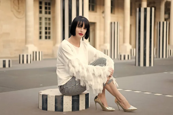 Beautiful young woman in Paris on holidays in France