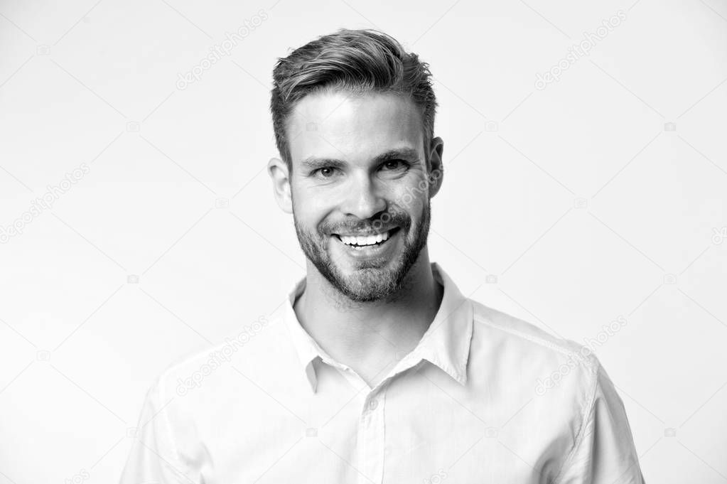 Brilliant smile. Man smiling face posing confidently yellow background. Man shop consultant looks cheerful confident and hospitable. Guy with bristle glad to help you in shop. Sincere emotions