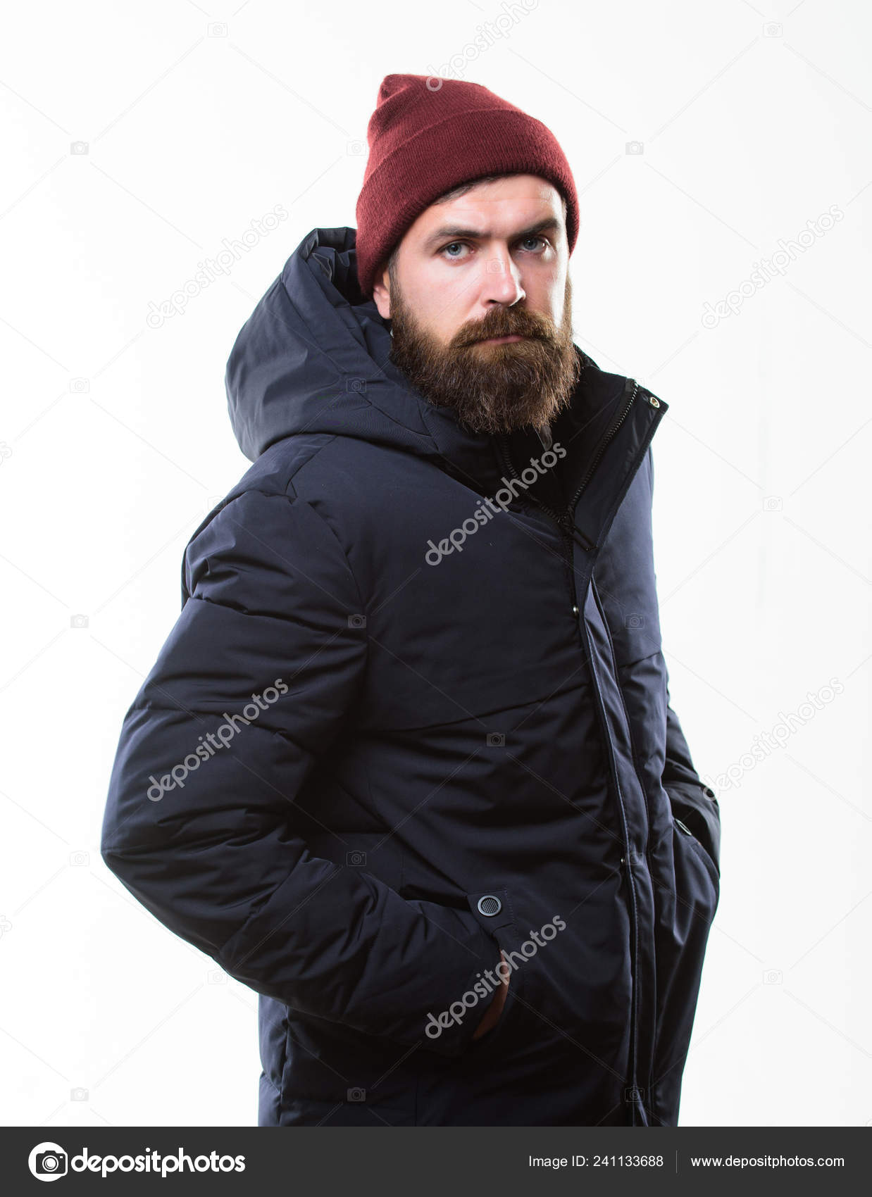 Guy wear hat and black winter jacket. Hipster style menswear. Hipster outfit.  Man bearded hipster posing confidently in warm black jacket or parka.  Stylish and comfortable. Hipster modern fashion Stock Photo by ©