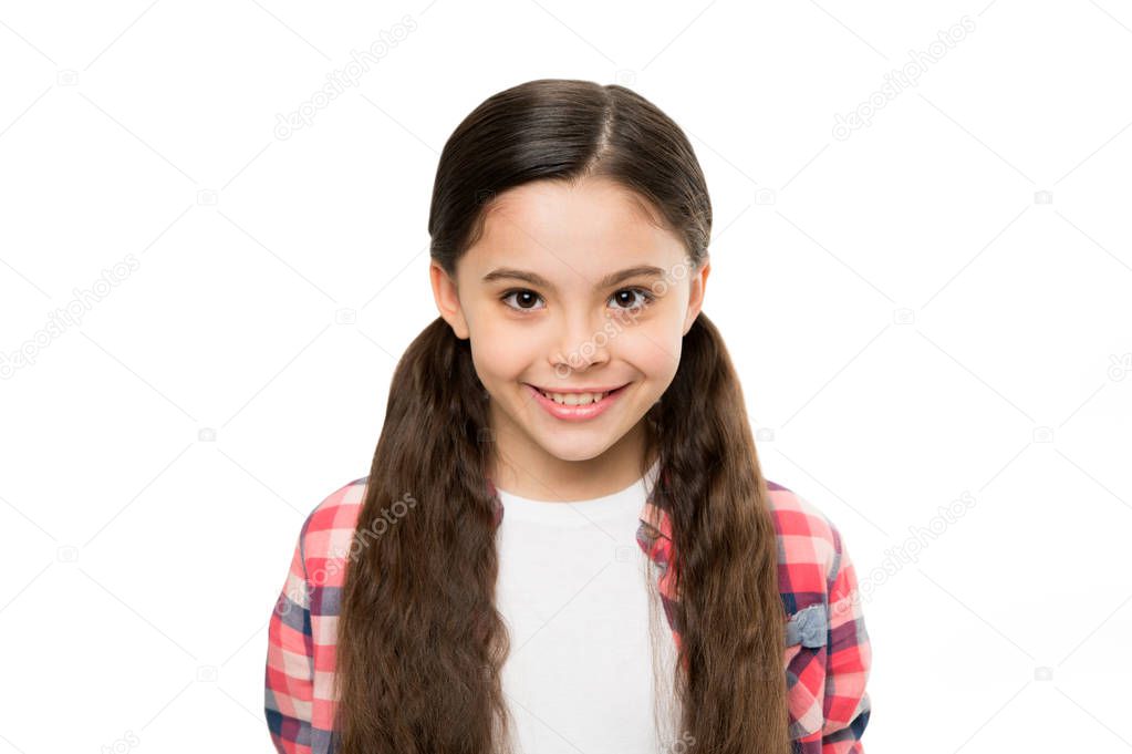 The joy of best hair. Happy girl with stylish ponytail hairstyle. Cute girl smile with new hairstyle. Little child with long locks of hair. Small beauty model with brunette hair. Her hair her look
