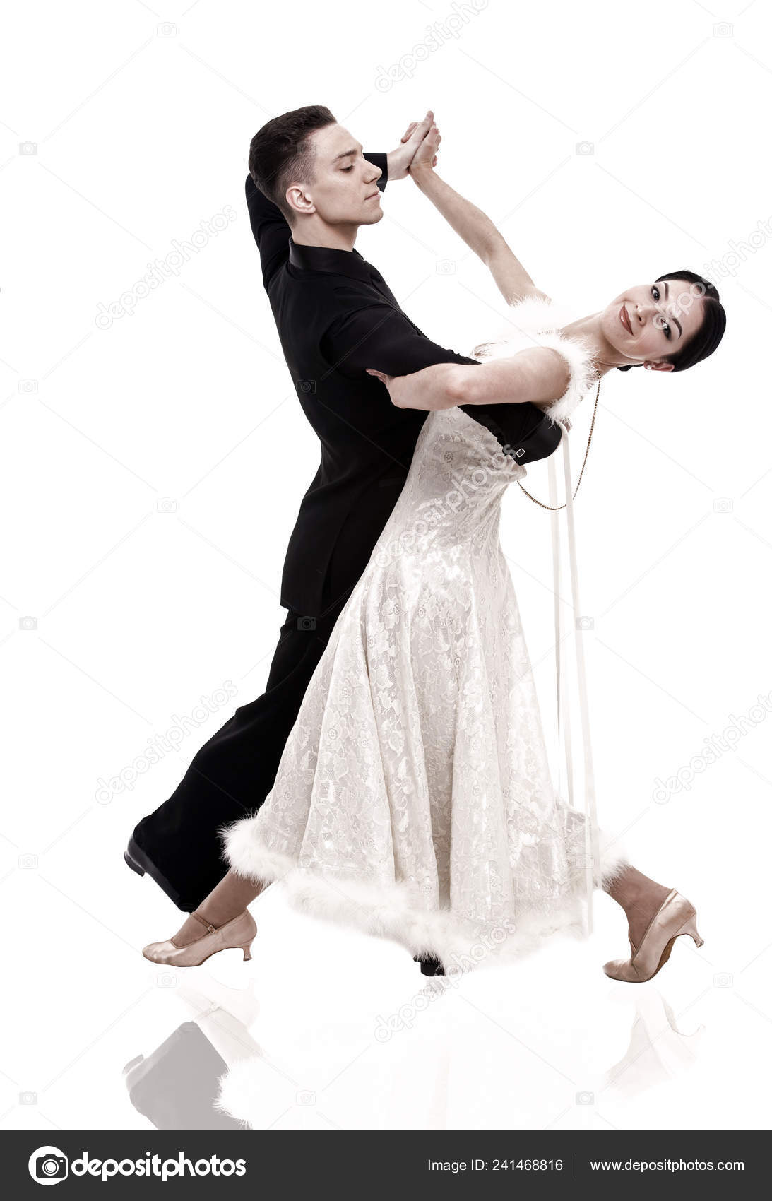 Young couple dancing social dance bachata, merengue, salsa, kizomba. Two  elegance pose on white room. - Stock Image - Everypixel