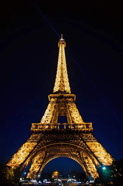 Paris, France-June 1, 2016 : Eiffel Tower with illumination at night in Paris, France. Romantic travel background. Eiffel tower is traditional symbol of paris and love. — Stock Photo, Image