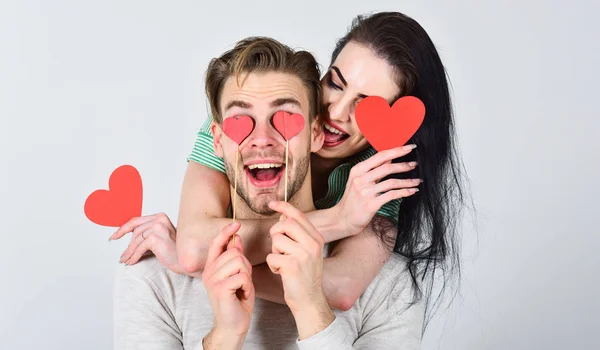 Valentines day and love. Romantic ideas celebrate valentines day. Man and pretty girl in love. Man and woman couple in love hold red heart valentines cards white background. Valentines day concept — Stock Photo, Image