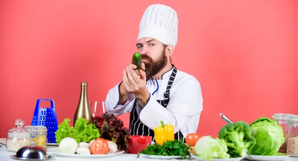 Chef man in hat. Secret taste recipe. Dieting and organic food, vitamin. Vegetarian. Unhealthy diet. Mature chef with beard. Bearded man cook in kitchen, culinary. Healthy food cooking — Stock Photo, Image