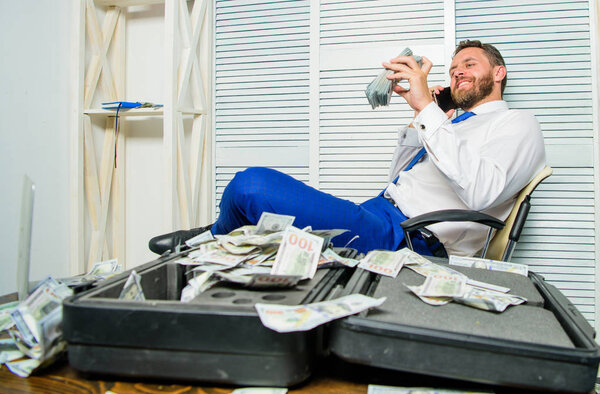 Financial fraud crime. Man earn money on mobile conversation fraud. Blackmail and money extortion. Illegal money profit concept. Successful deal. Man fraudster speak mobile phone ask for money