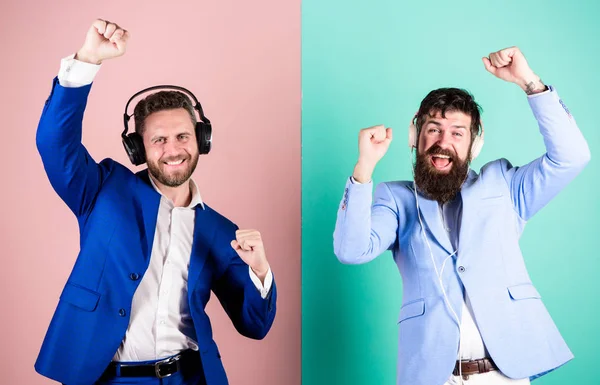 Colleagues listen to music. Music and relax. Men bearded faces formal suit enjoy song. Playlist for office work. Music break during working day. Business people with headphones listening music