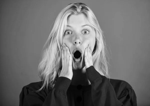 Shocking news concept. Girl shocked overwhelmed by surprise. Surprised woman cant believe her eyes. Christmas is coming soon. Lack of time. Shocked face blonde girl. Lady shocked emotional expression