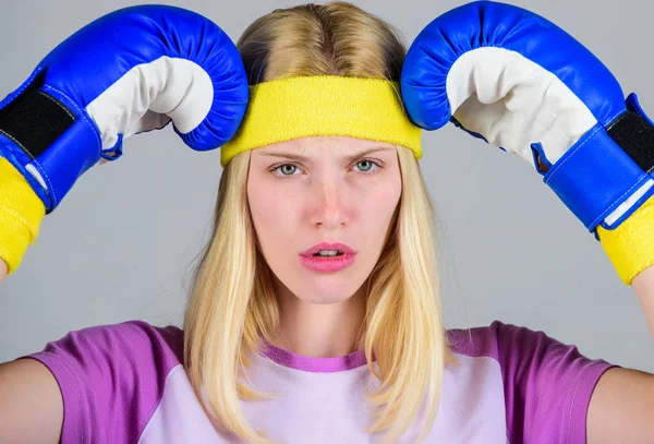 Girl boxing gloves tired to fight. Strong woman suffer pain. Girl painful face embrace head with boxing gloves. Headache remedies. Headache concept. Keep calm and get rid of headache. Beat headache — Stock Photo, Image