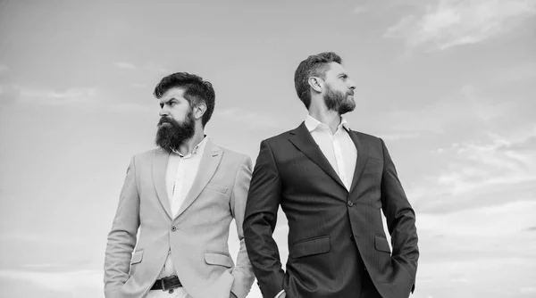 Bearded business people posing confidently. Perfect in every detail. Business men stand blue sky background. Business people concept. Well groomed appearance improves business reputation entrepreneur — Stock Photo, Image