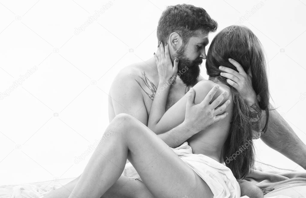 Man with beard sexual foreplay. Foreplay master. Sex and love concept. Hot foreplay ideas. Couple intimate atmosphere. Couple make love have sex. Lover and sexy naked female body foreplay in bed