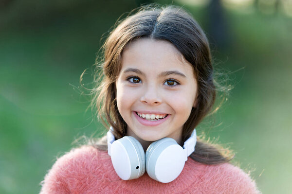 Girl cute child with headphones. Reasons you should use headphones. Headphones changed world. Headphones bring privacy to public spaces. Active lifestyle music play list. Music always with me