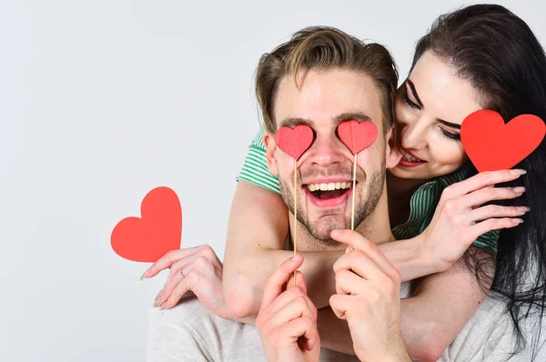 Man and woman couple in love hold red heart valentines cards white background. Valentines day concept. Valentines day and love. Romantic ideas celebrate valentines day. Man and pretty girl in love — Stock Photo, Image
