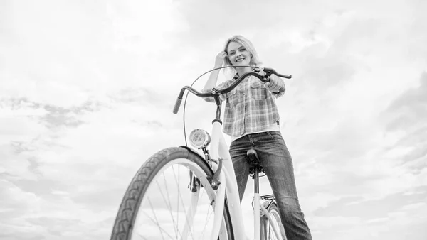 How cycling changes your life and make you happy. Reasons to ride bicycle. Mental health benefits. Pedaling towards happiness. Girl rides bicycle sky background. Woman feels happy while enjoy cycling