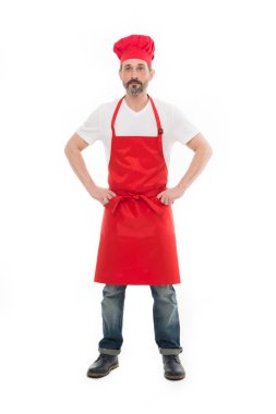 Ev işi, yemek pişirmek ve temizlik içerir. Önlük ve Şef şapkasını sakallı olgun adam. Üst düzey aşçı sakal ve bıyık önlük önlük giyiyor. Kırmızı önlük pişirme olgun şef aşçı. Ev yemekleri