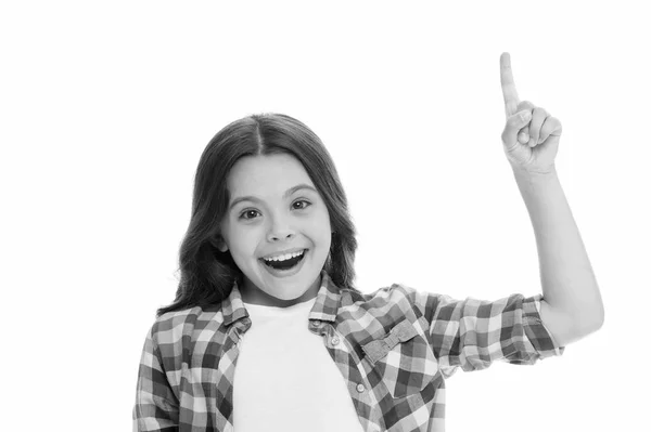Kid point finger up isolated white. Child cute face brunette hair pointing upwards. Girl casual look recommend check this out. This direction. Subscribe or check. Push button turn on notification — Stock Photo, Image
