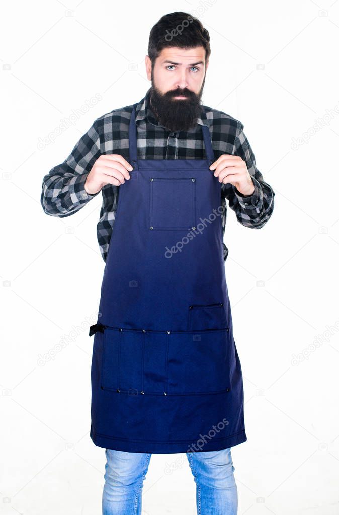Picnic and barbecue. Man cook brutal hipster. Fast food restaurant. Serious bearded cook. Restaurant staff. Ready to cook. Bearded hipster wear apron for barbecue. Roasting and grilling food